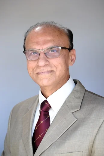 Portrait of Dr. Kiritkumar Masrani, President